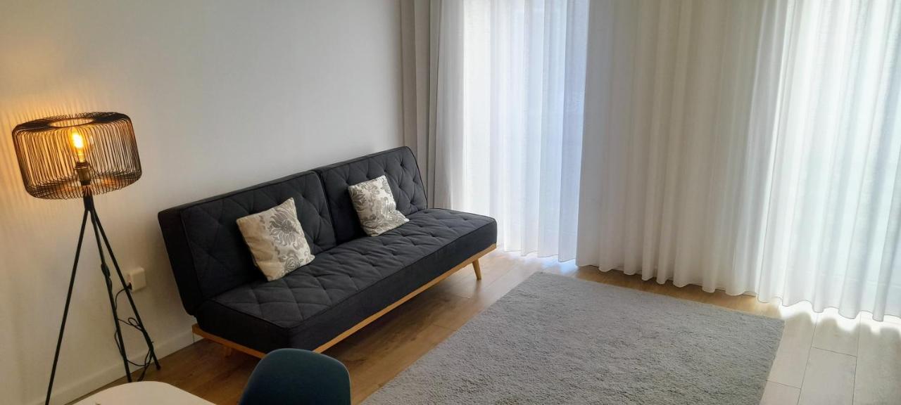 Light Brown Central Apartment Aveiro Bagian luar foto